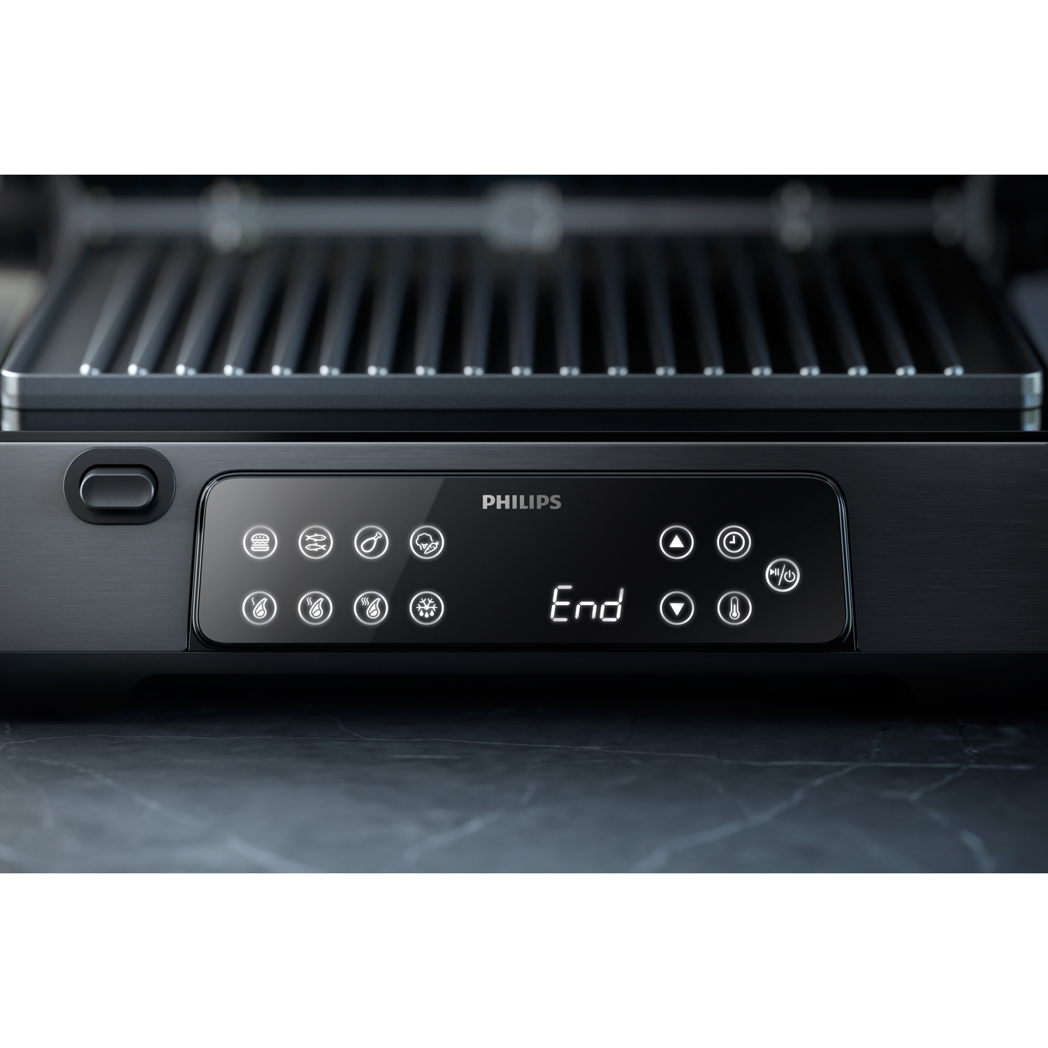 Close-up of a Philips grill control panel with buttons and an 'End' display.