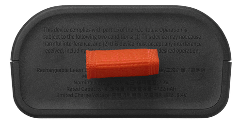 Spód czarnego urządzenia z pomarańczowym paskiem i wydrukowanymi informacjami.