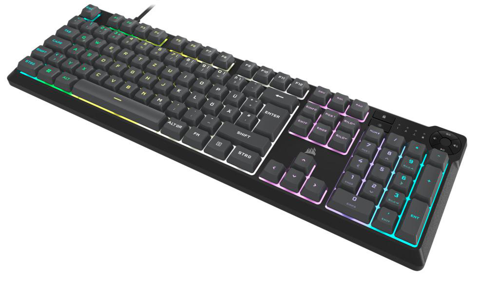 Eine schwarze mechanische Tastatur mit beleuchteten Tasten, zeigt mehrfarbige Beleuchtung.