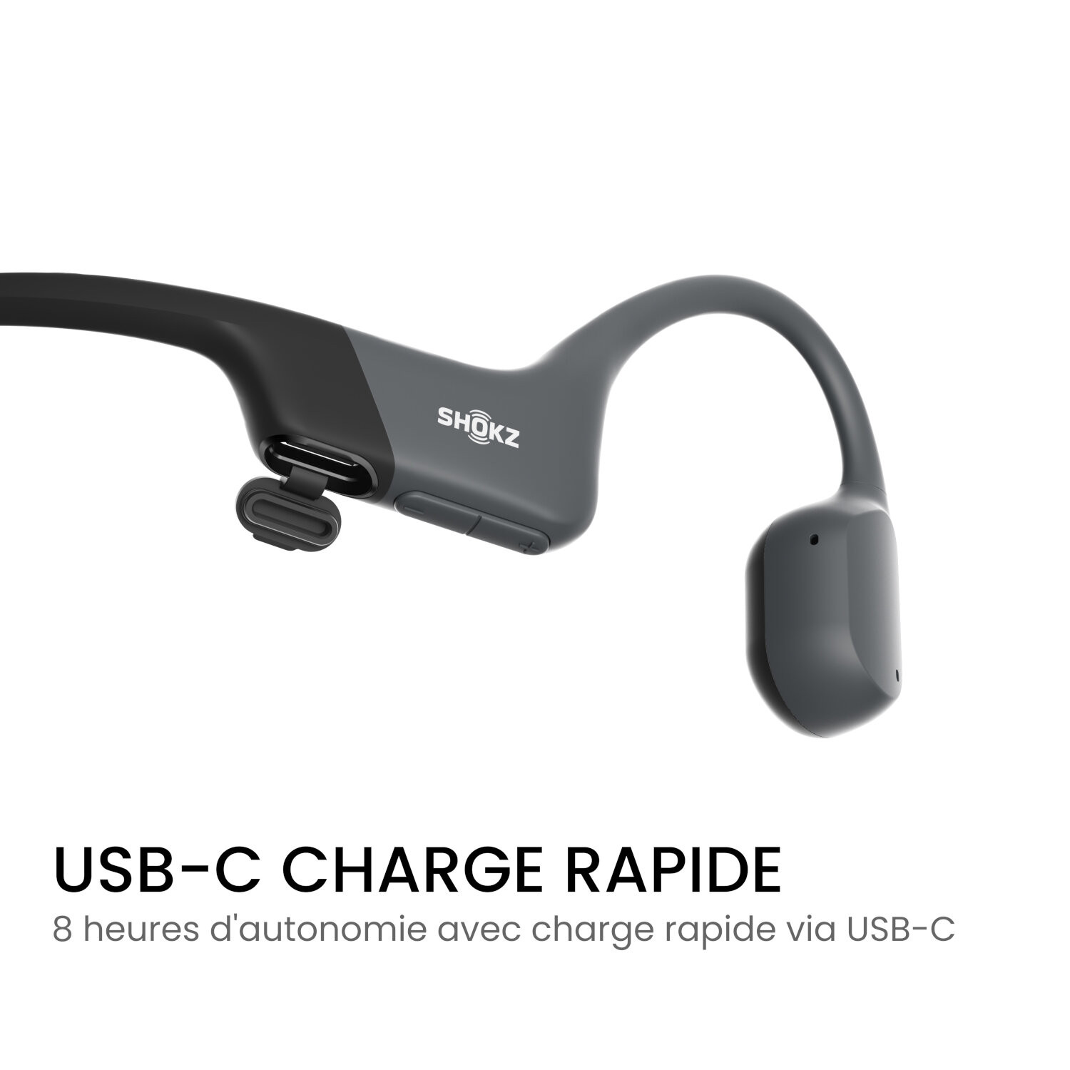 Casque à conduction osseuse noir et gris avec texte sur la charge USB-C.