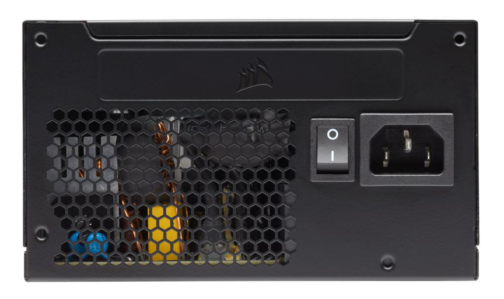 Die Rückseite eines schwarzen Netzteils mit Lüfter und Ein/Aus-Schalter.