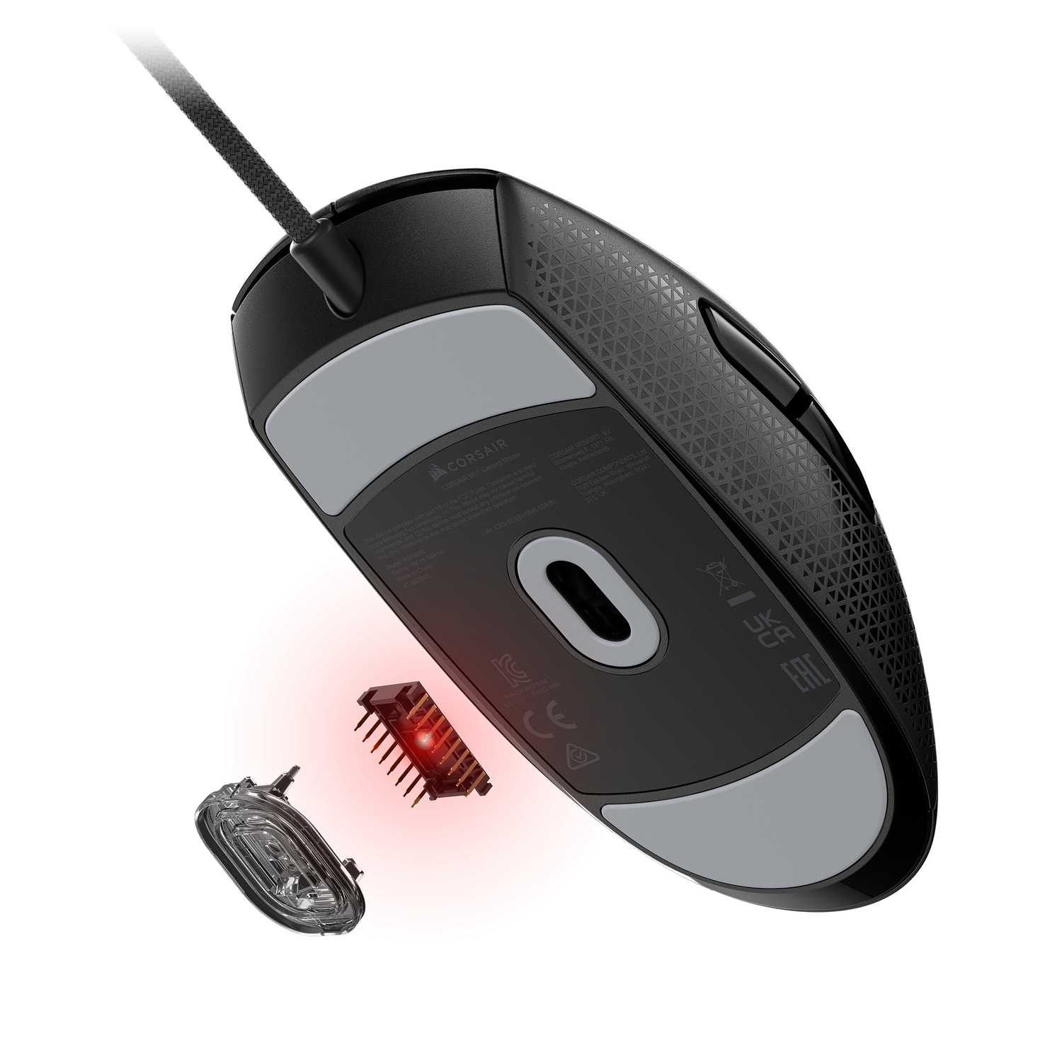 Zwarte Corsair-muis, gedemonteerd met rood licht en componenten.