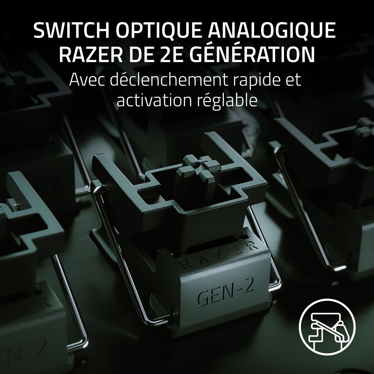 Gros plan sur un interrupteur de clavier mécanique noir. Texte : RAZER GEN-2, SWITCH OPTIQUE ANALOGIQUE.