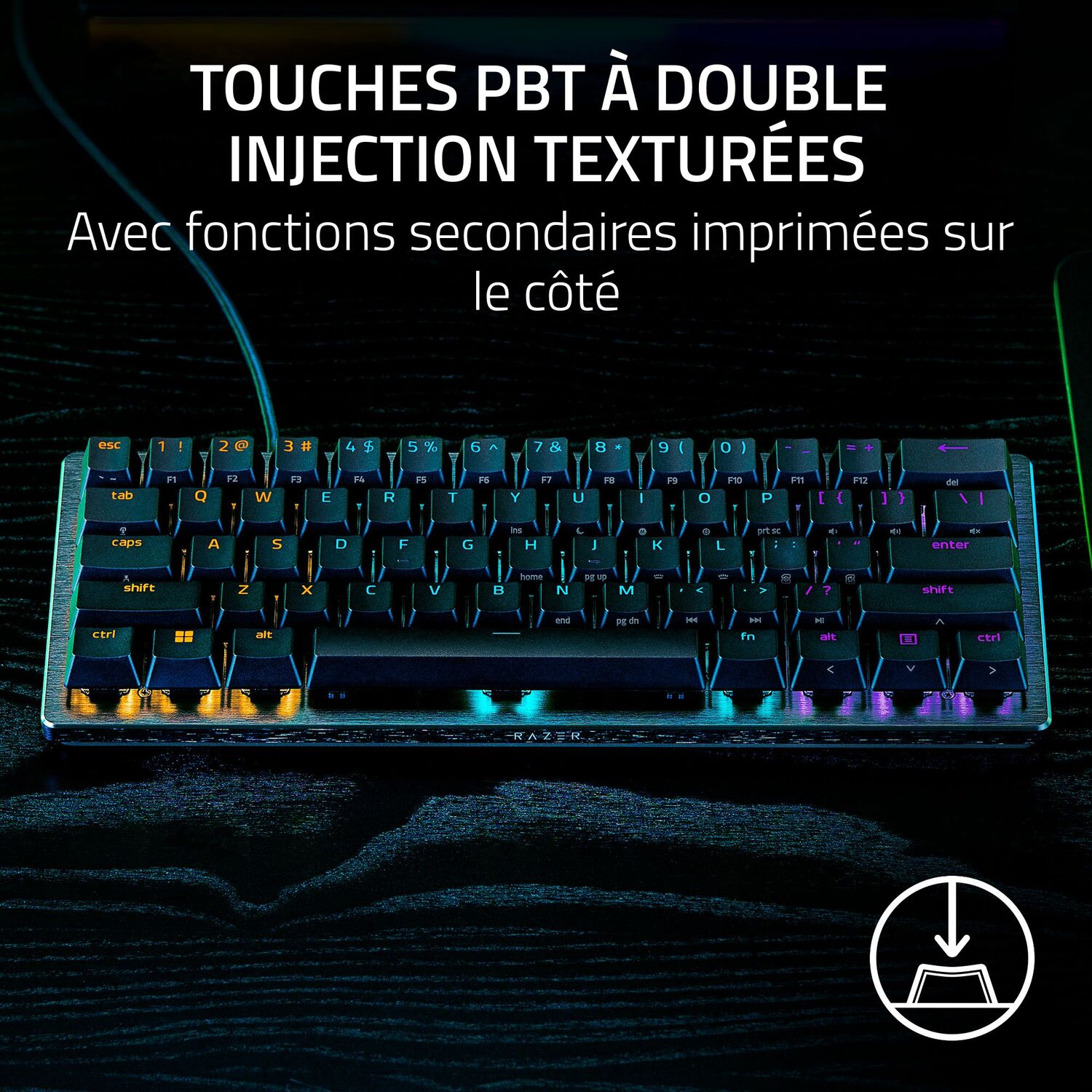 Clavier noir avec texte, logo Razer et touches éclairées.