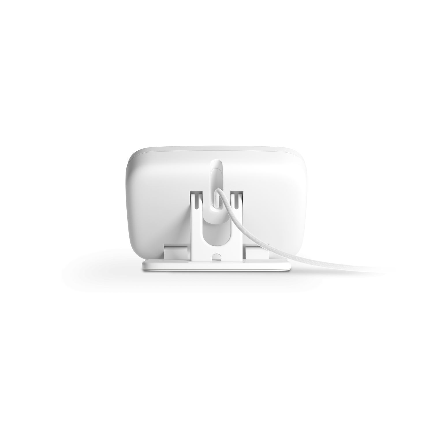 White device with a cable. It has a stand and a cable. The device has a curved design.