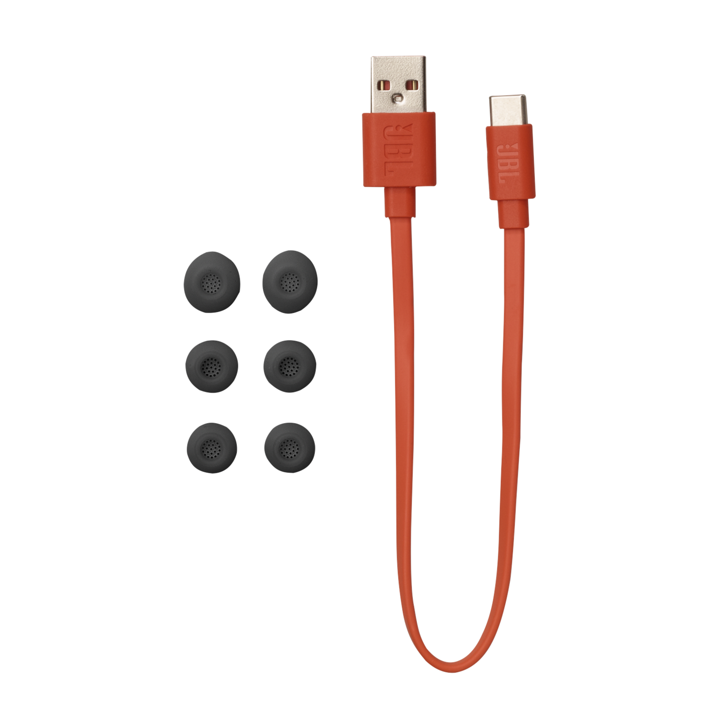 Oortips, oranje USB-kabel en een USB-C-kabel. Zwarte achtergrond.
