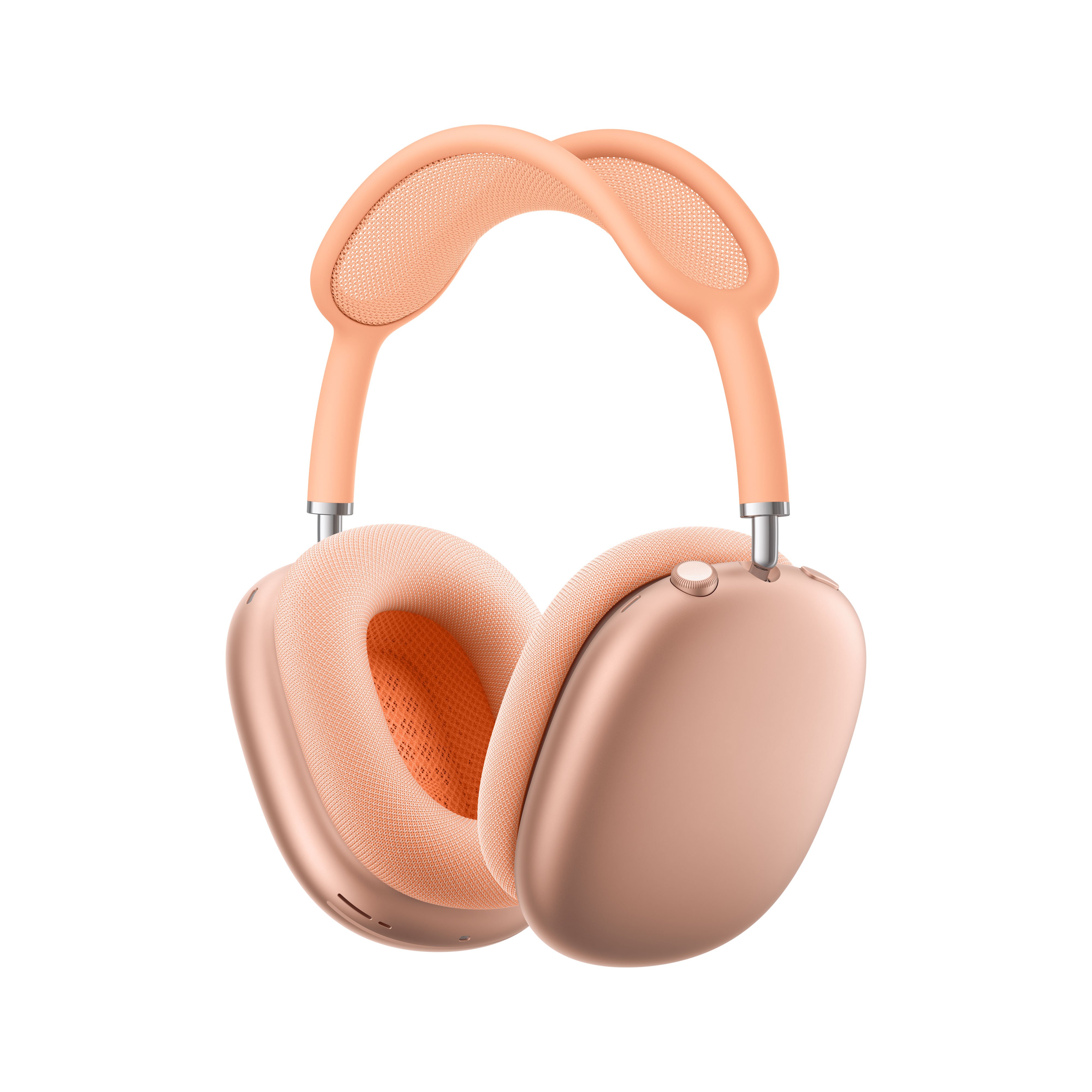 Pfirsichfarbene Over-Ear-Kopfhörer. Hellpfirsichfarbene Ohrpolster und Kopfband.