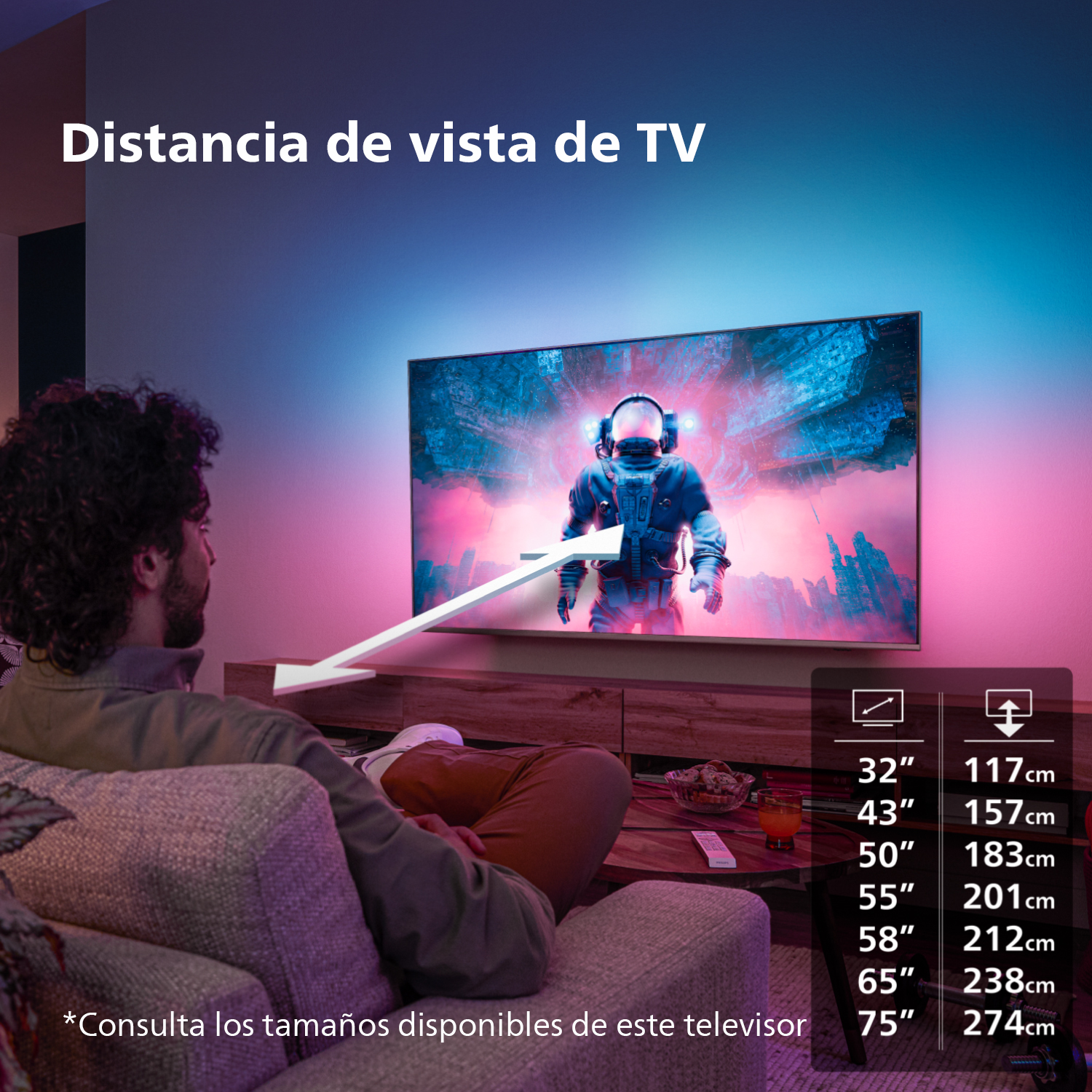 Un hombre sentado mirando una TV con un astronauta en la pantalla.