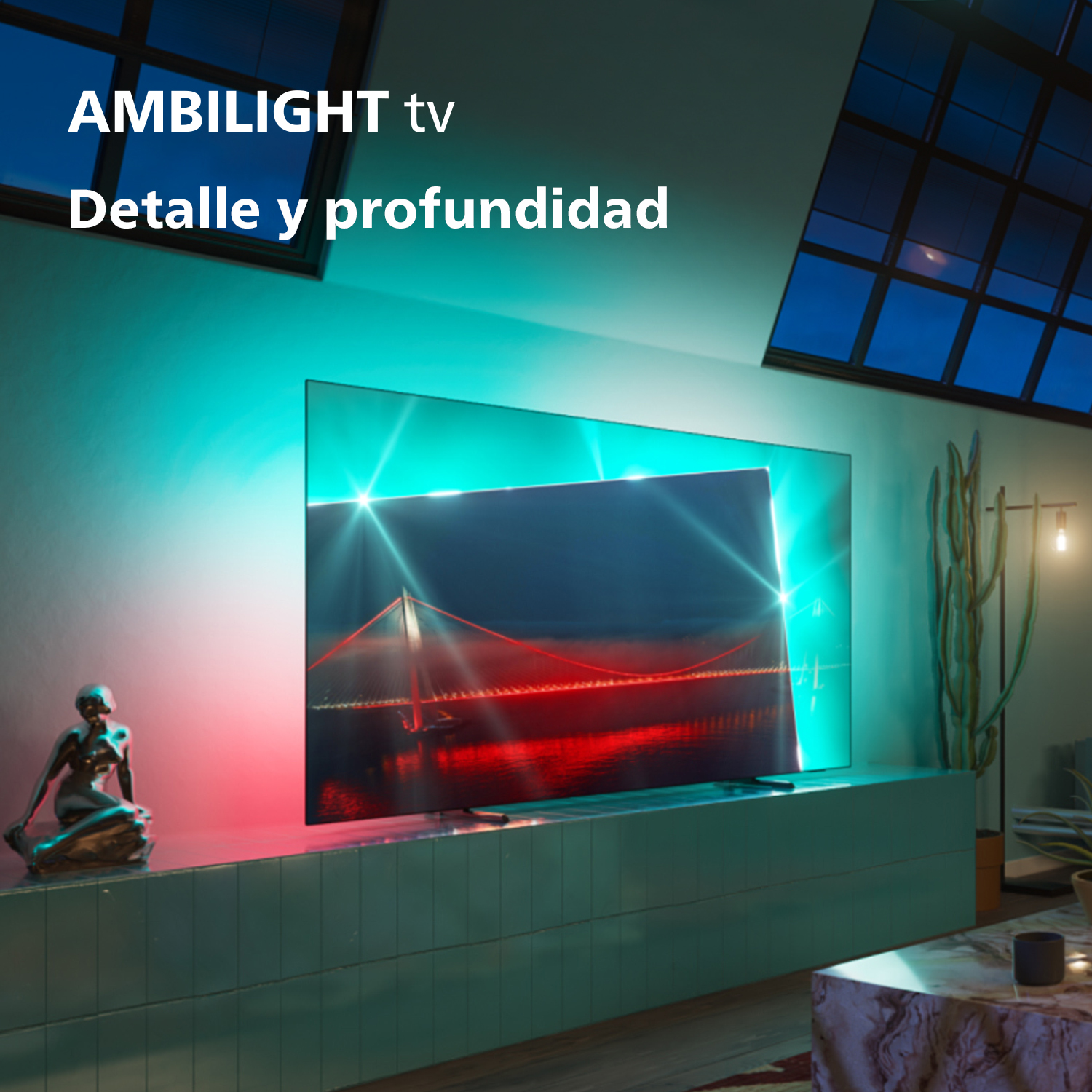Una habitación con un televisor que muestra una imagen hermosa. La función Ambilight está activa y la habitación está iluminada.