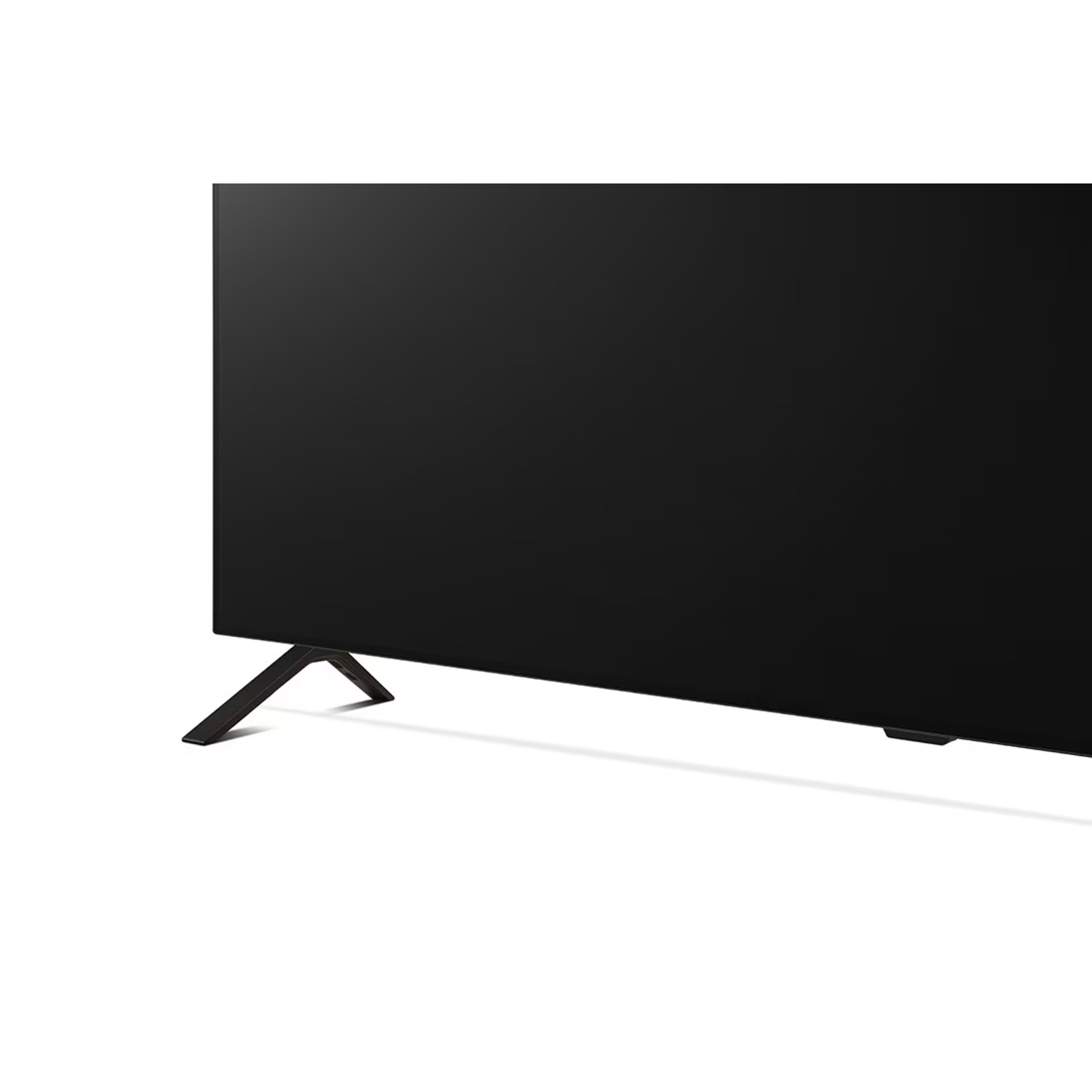 Écran de télévision noir avec support noir, vue de coin, sur fond blanc.