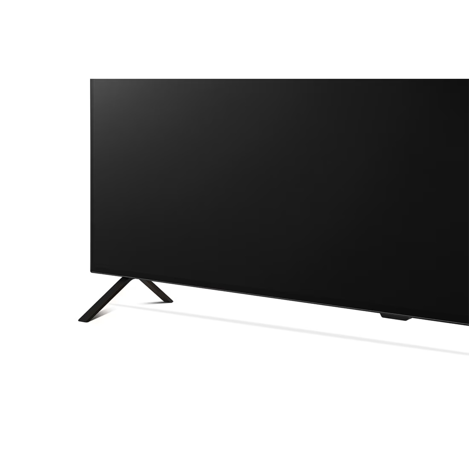 Gros plan d'un écran de télévision et d'un pied. L'écran est noir et le pied est noir et incliné.