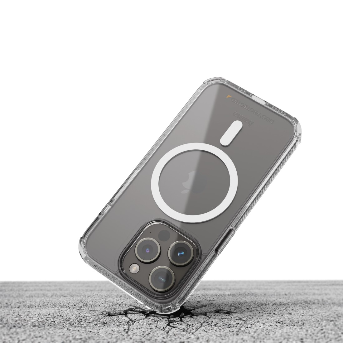 Eine transparente Handyhülle mit einem schwarzen iPhone. Das Telefon und die Hülle liegen auf einer rissigen Betonoberfläche.