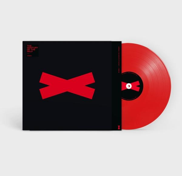 Vinil lemez fekete tokban, piros X dizájnnal. A lemez piros.