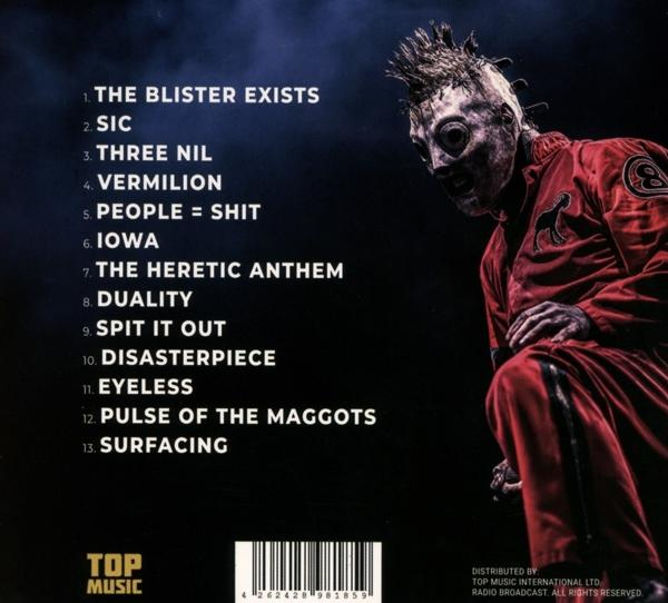 CD-Cover mit einem Bandmitglied in Rot, mit einer Liste von Songs. Die Worte 'TOP MUSIC' und 'SLIPKNOT' sind sichtbar.