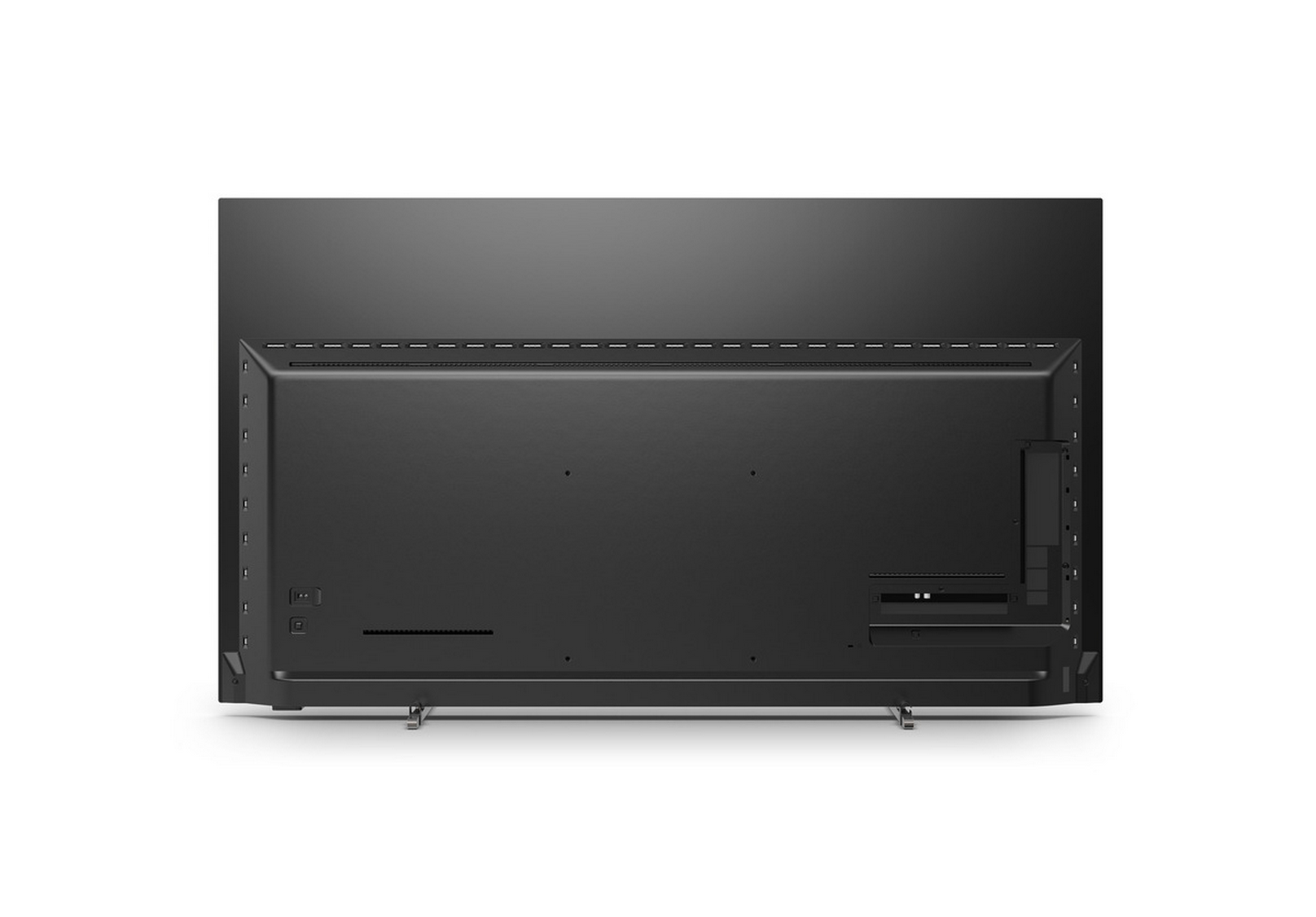 Vista trasera de un televisor negro. Tiene varios puertos y conectores en la parte trasera.