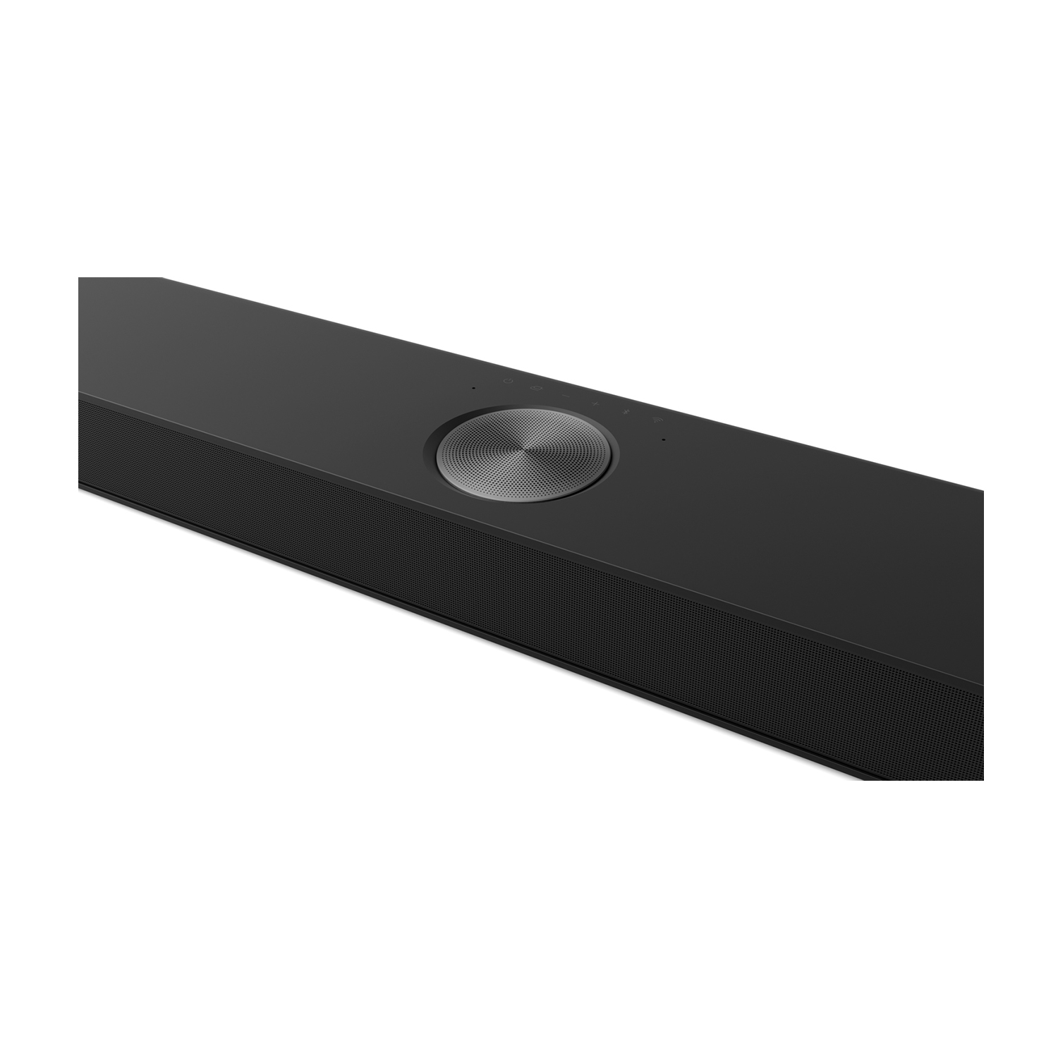 Primo piano di una soundbar nera con un pannello di controllo circolare. Sfondo bianco.