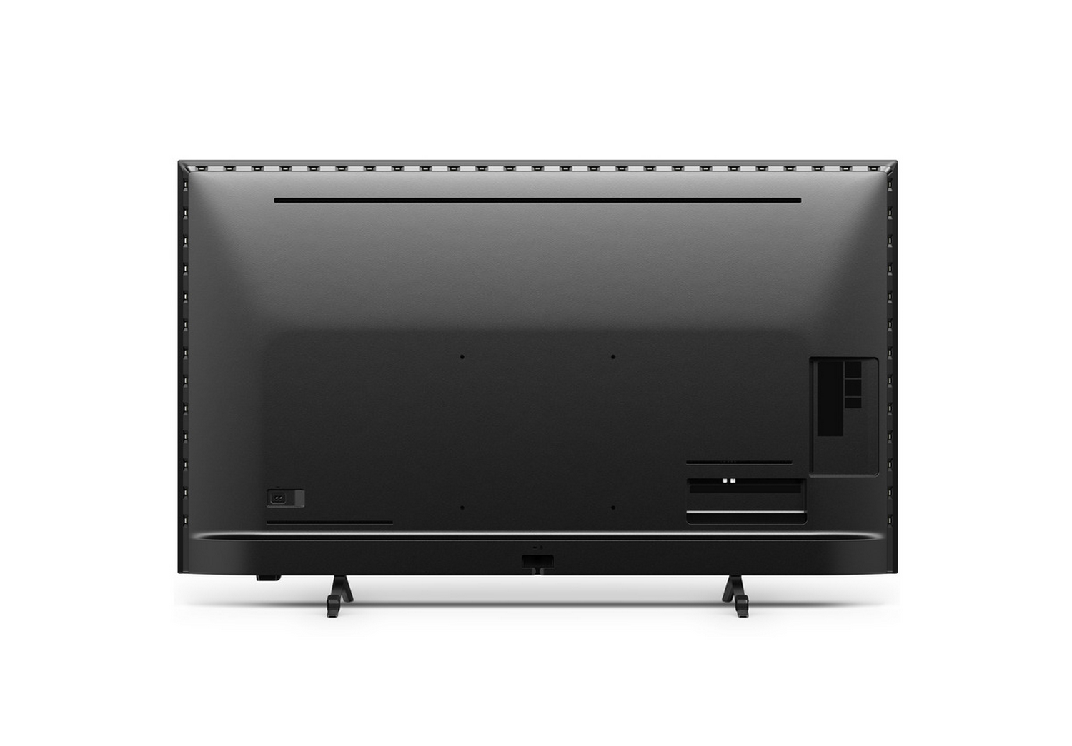 La parte trasera de un televisor negro con puertos y soporte, aislado sobre fondo blanco.
