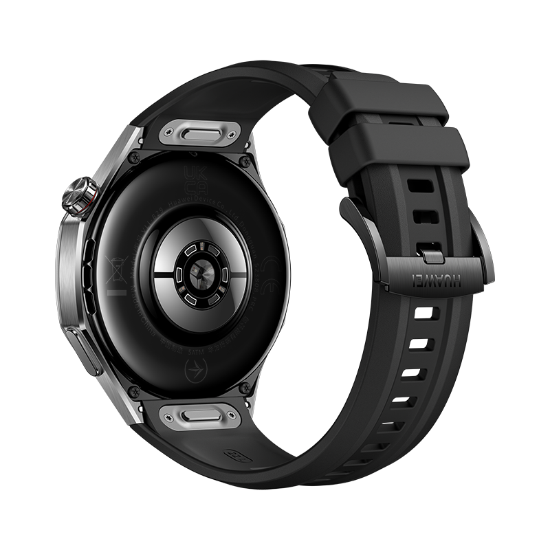 Smartwatch sobre fondo negro. Muestra la parte trasera del reloj, la correa y la hebilla.