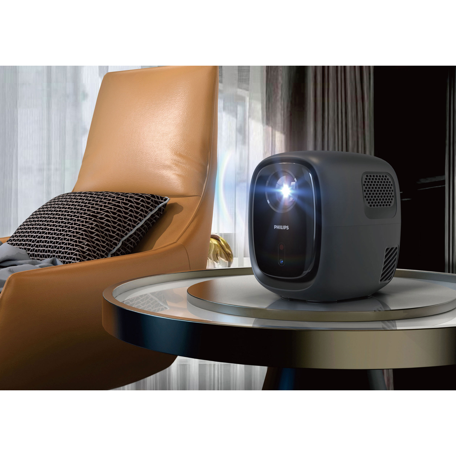 A black projector sits on a table. It projects light toward the viewer. Brown chair in background.