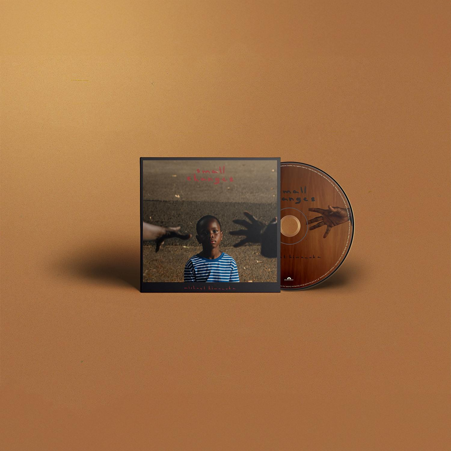 Ein CD-Case mit einem Foto eines jungen schwarzen Jungen und Händen.