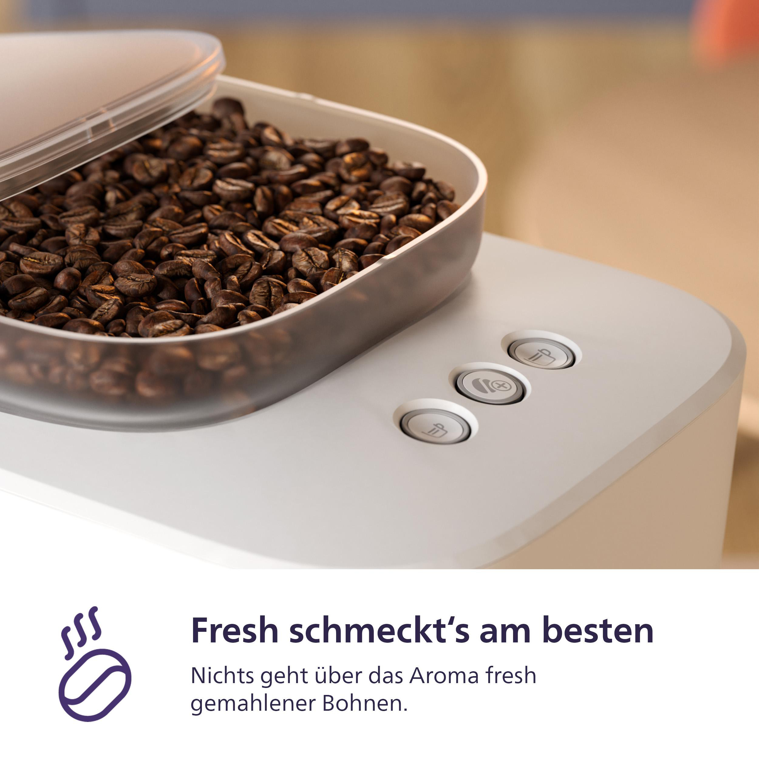 Eine weiße Kaffeemaschine mit einem durchsichtigen Behälter mit Kaffeebohnen.