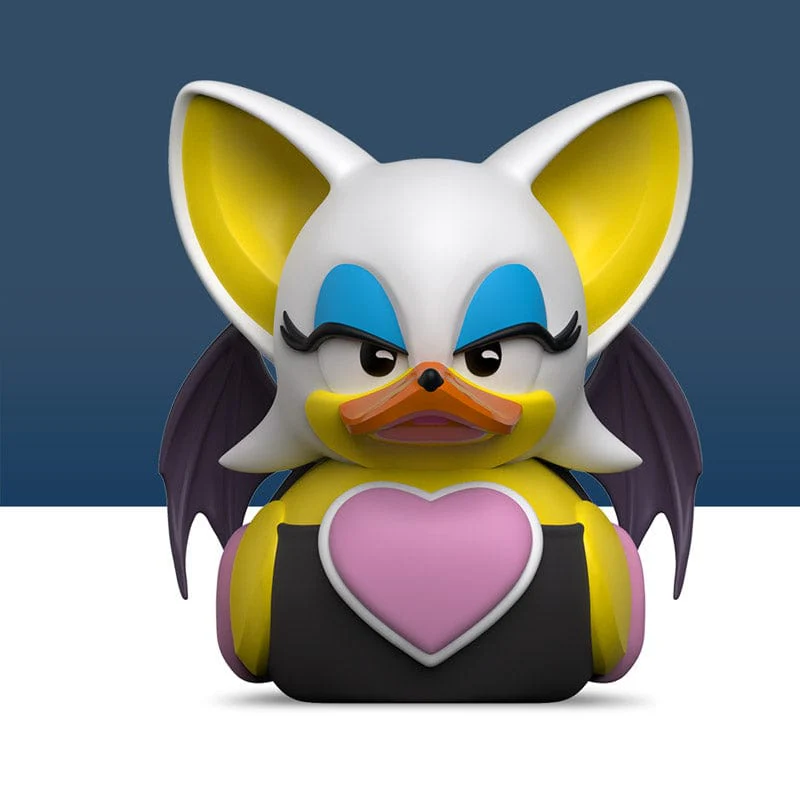 Rouge the Bat gumikacsa. Fehér fej, sárga fülek, kék szemek, rózsaszín szív a mellkason.