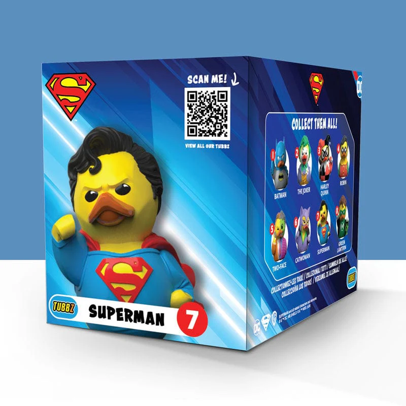 Superman Tubbz figura dobozban más DC karakterekkel. A doboz különböző karaktereket mutat.