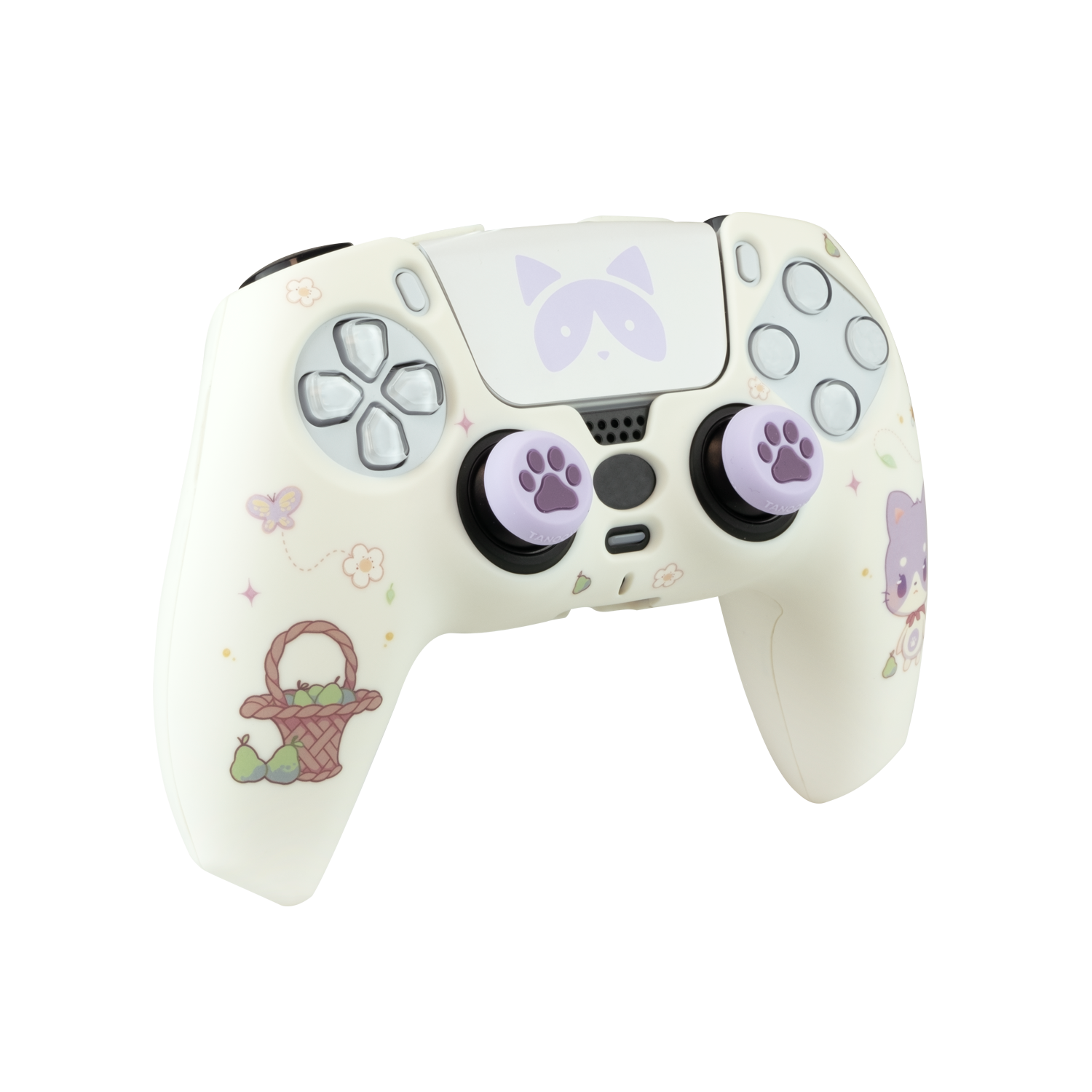 Un mando de juegos blanco con diseños florales y huellas de patas. Tiene joysticks y botones morados. Una cesta de peras.