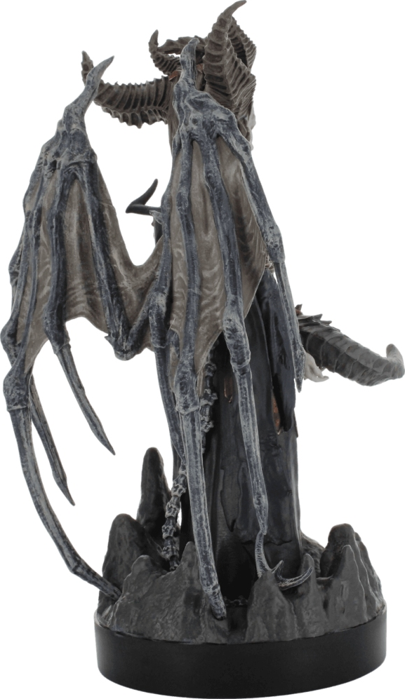 Eine Figur eines geflügelten Dämons mit Hörnern.