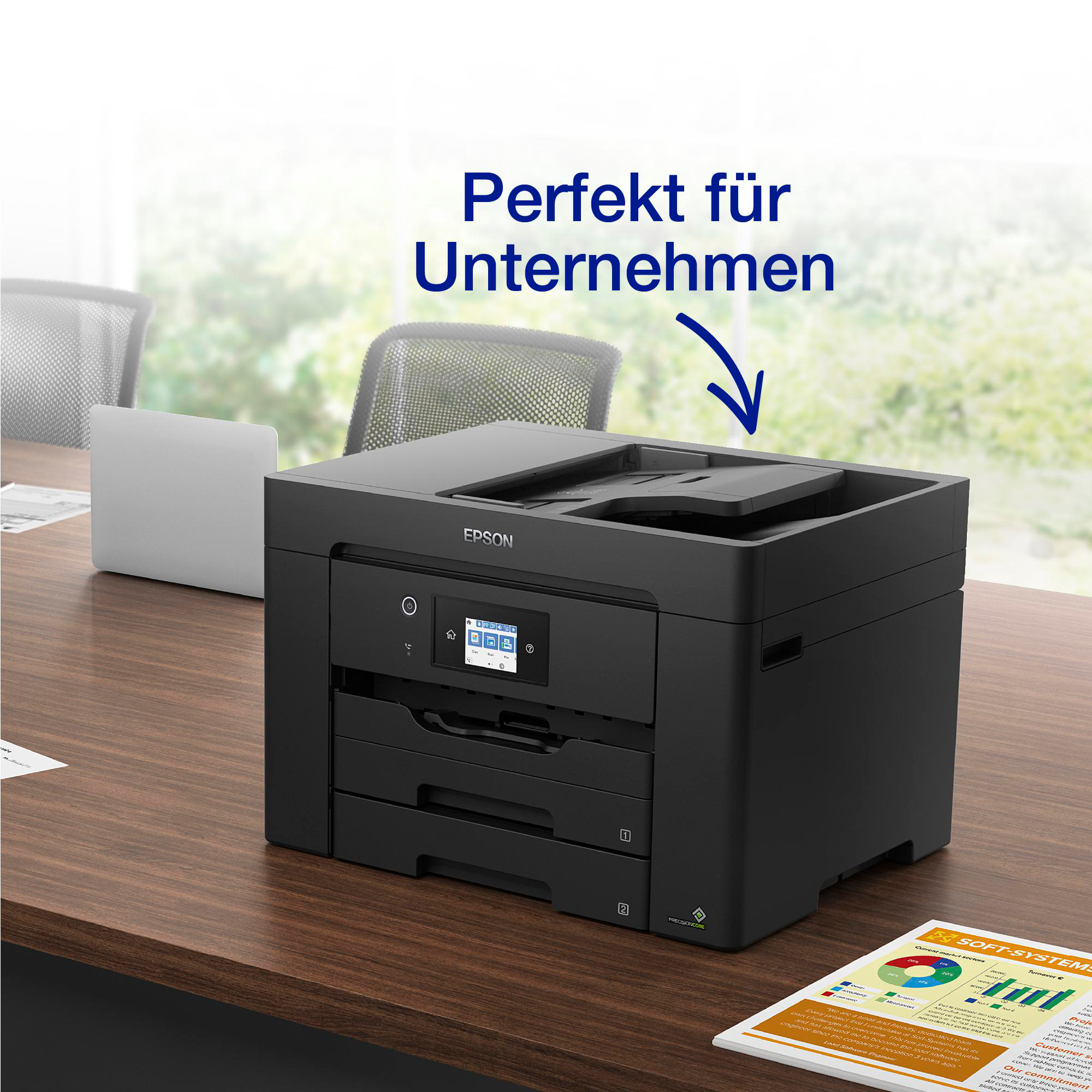 Schwarzer Bürodrucker auf einem Schreibtisch mit Laptop, Text oben: Perfekt für Unternehmen.