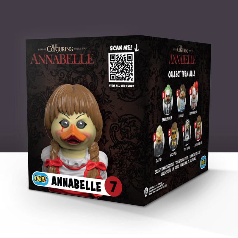 Annabelle kacsa baba egy dobozban. A doboz Annabelle-t és más karakterképeket mutat.