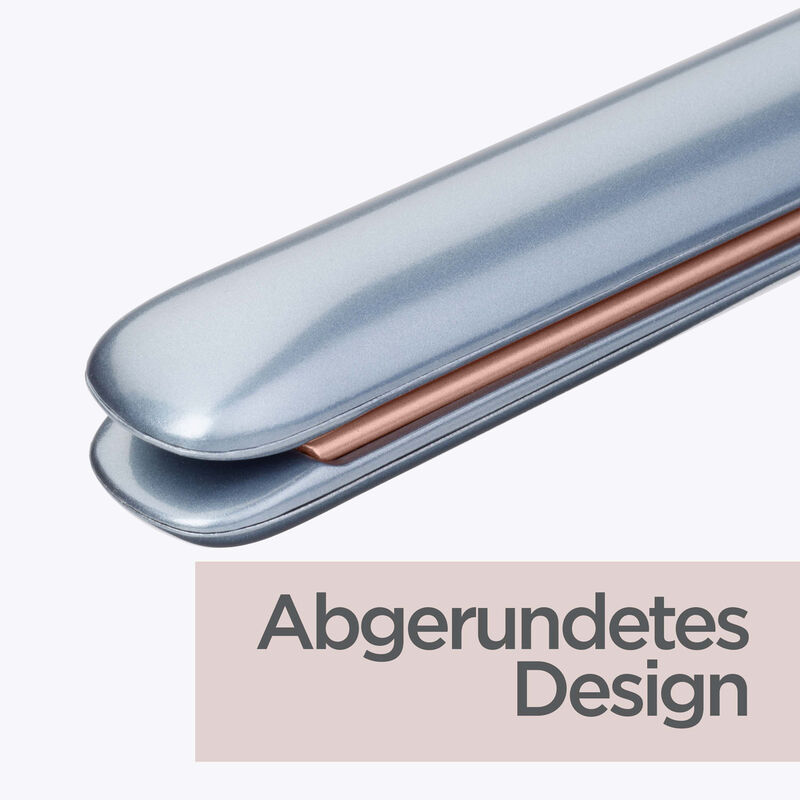 Una piastra per capelli grigia e color rame con un design arrotondato.