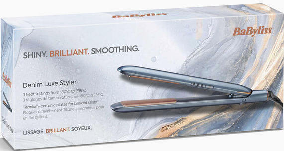 Scatola Denim Luxe Styler con un styler all'interno. Scatola blu con dettagli dorati.