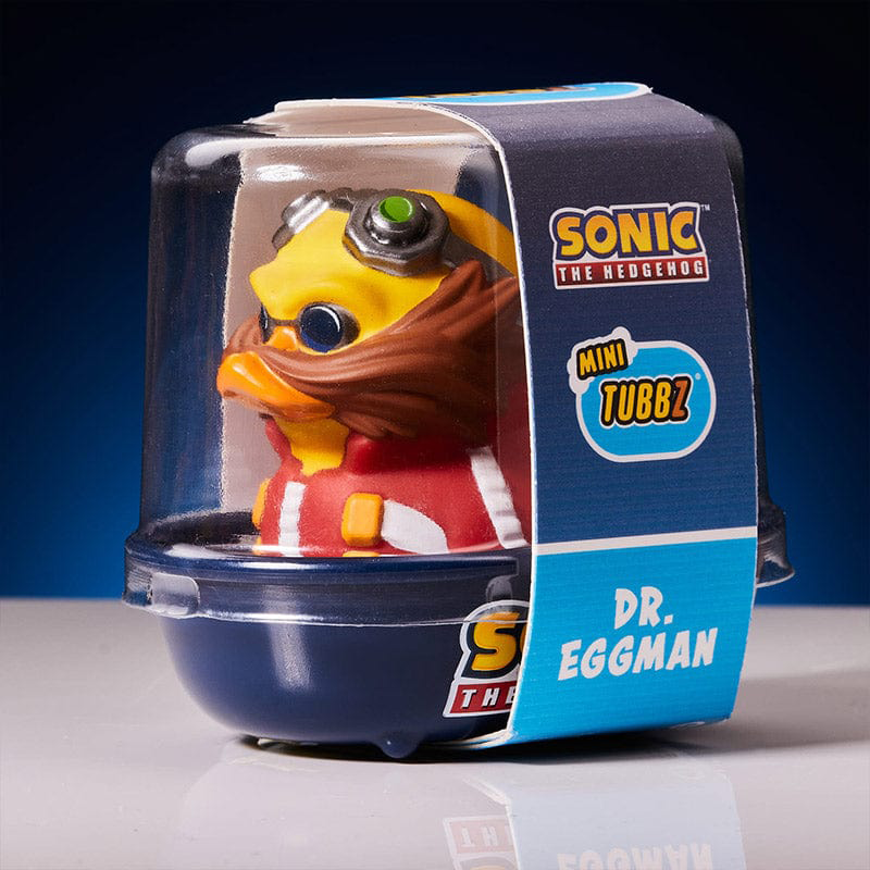 Egy Dr. Eggman Mini Tubbz figura egy átlátszó műanyag tokban, Sonic the Hedgehog felirattal.