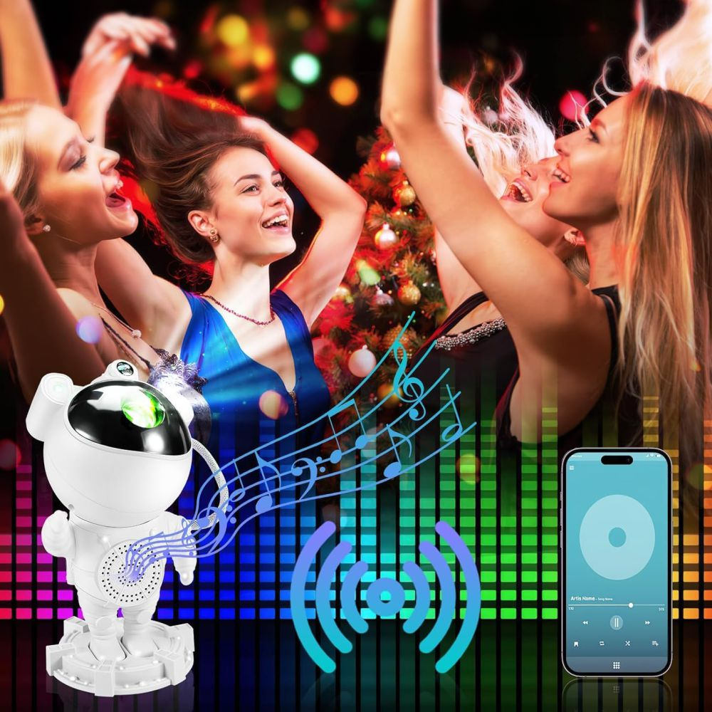 Ludzie tańczą, robot odtwarza muzykę z telefonu.