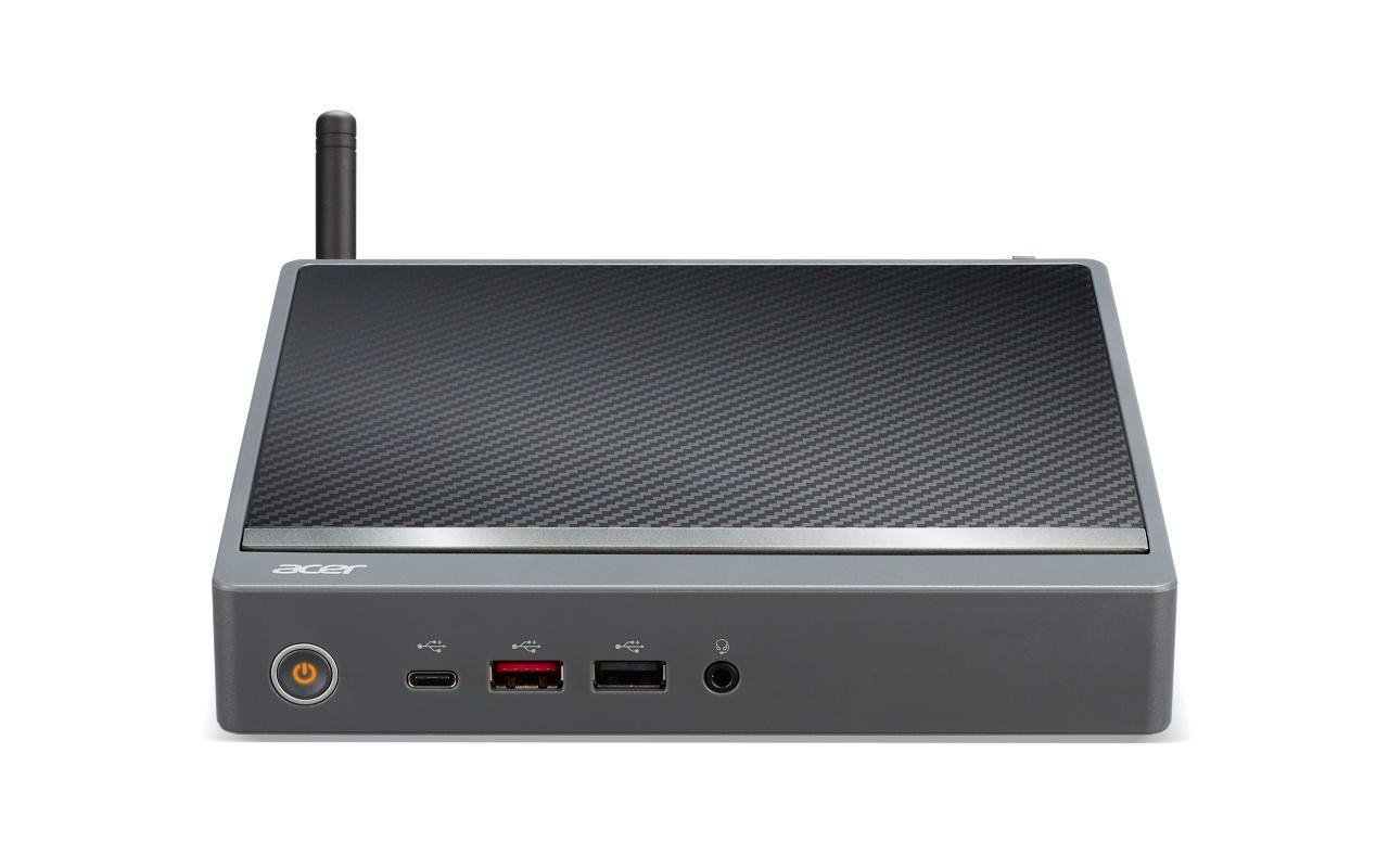 Ein grauer Desktop-Computer. Er hat eine schwarze Oberseite mit Antenne und Acer-Logo.