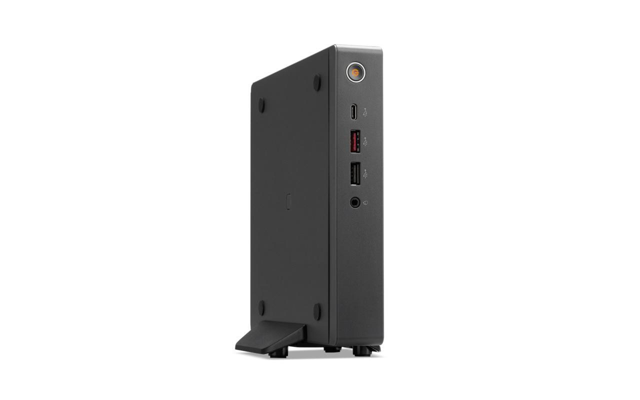 Ein schwarzes, rechteckiges Lenovo-Computergerät. Es hat mehrere Anschlüsse an der Seite und steht aufrecht.
