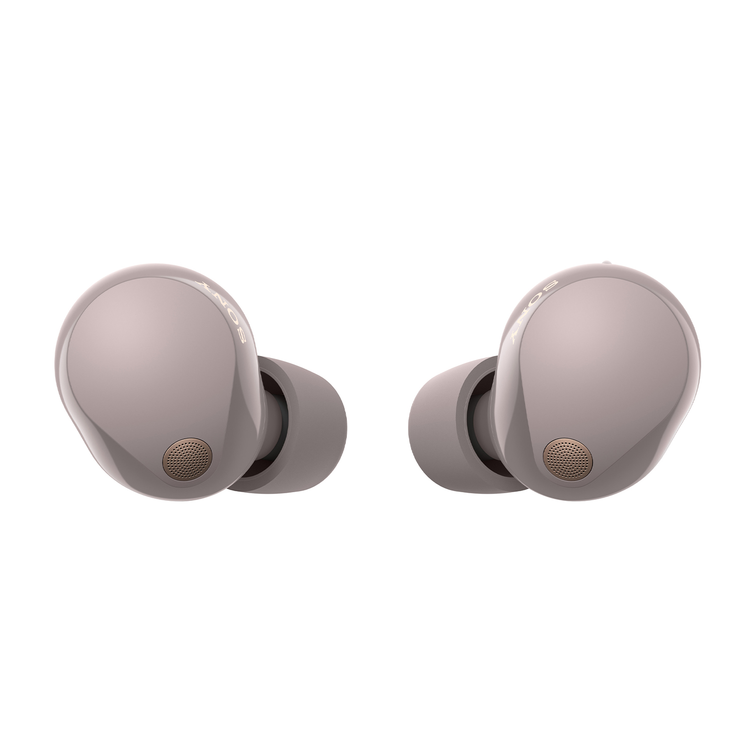 Due auricolari wireless. Sono grigio-beige con accenti dorati sulla superficie.
