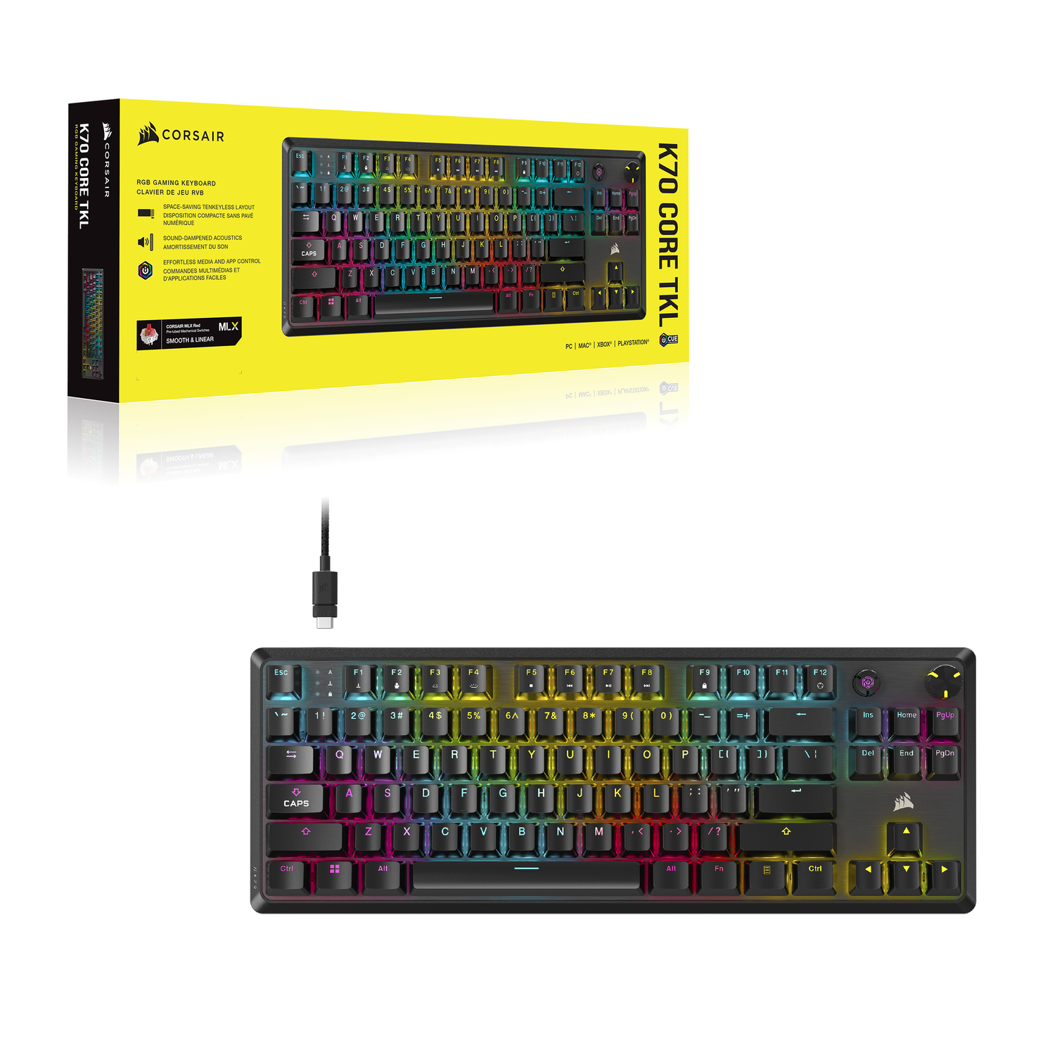 A black keyboard with rainbow backlit keys. The box is in the background with its specifications.