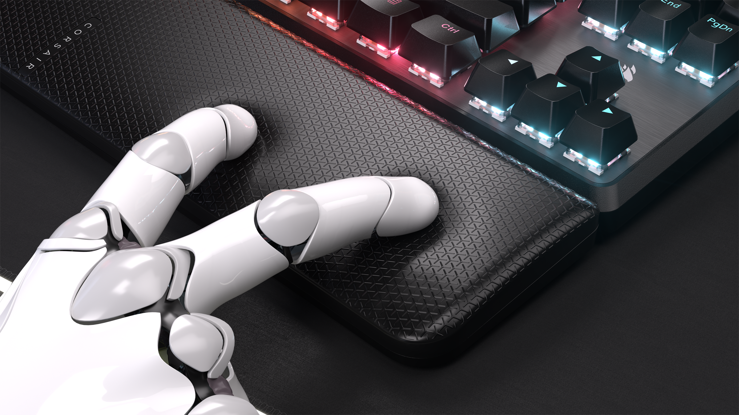 Une main robotique touchant un repose-poignet noir à côté d'un clavier.