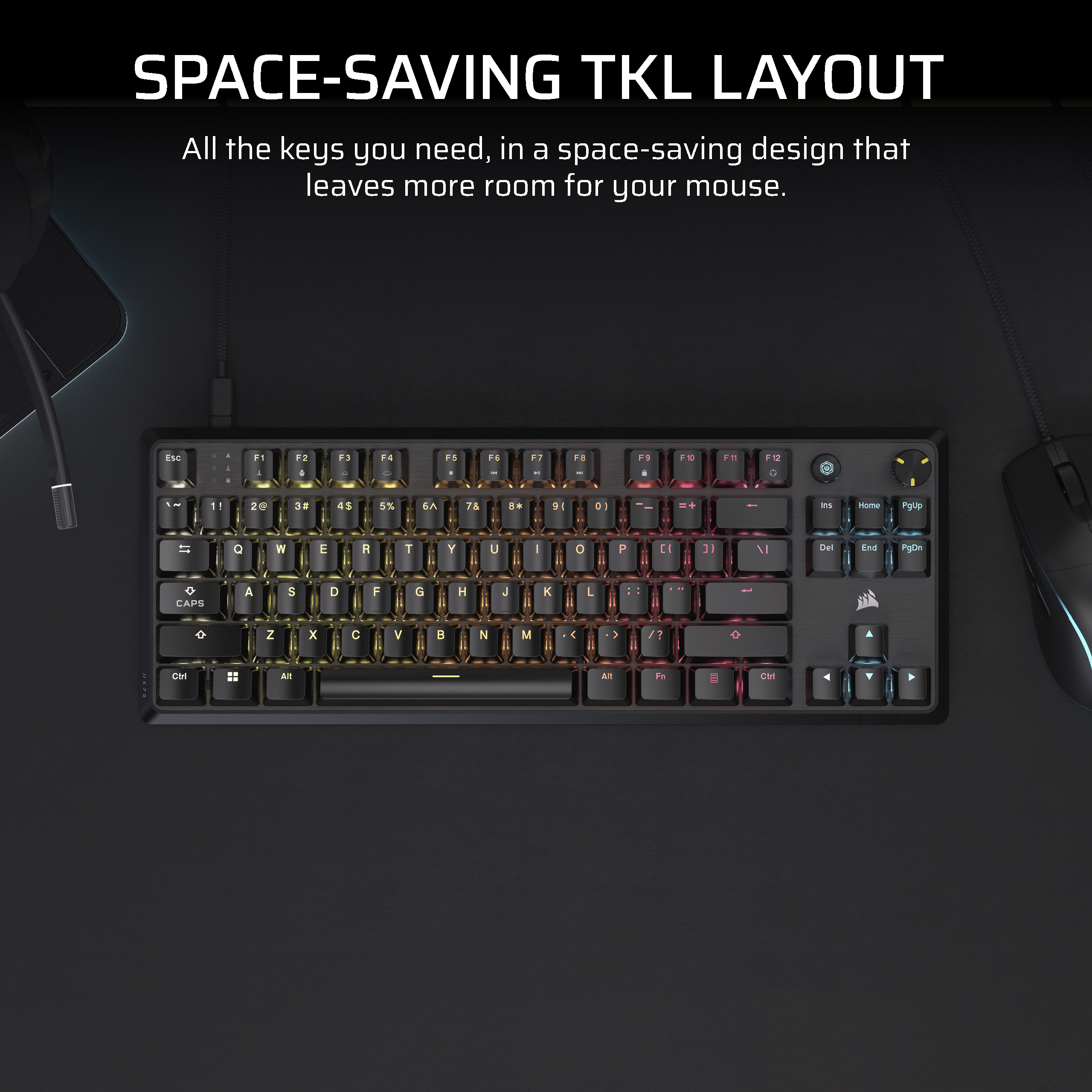 Tastiera TKL nera con illuminazione RGB su superficie scura. Il testo 'SPACE-SAVING TKL LAYOUT' è sopra.