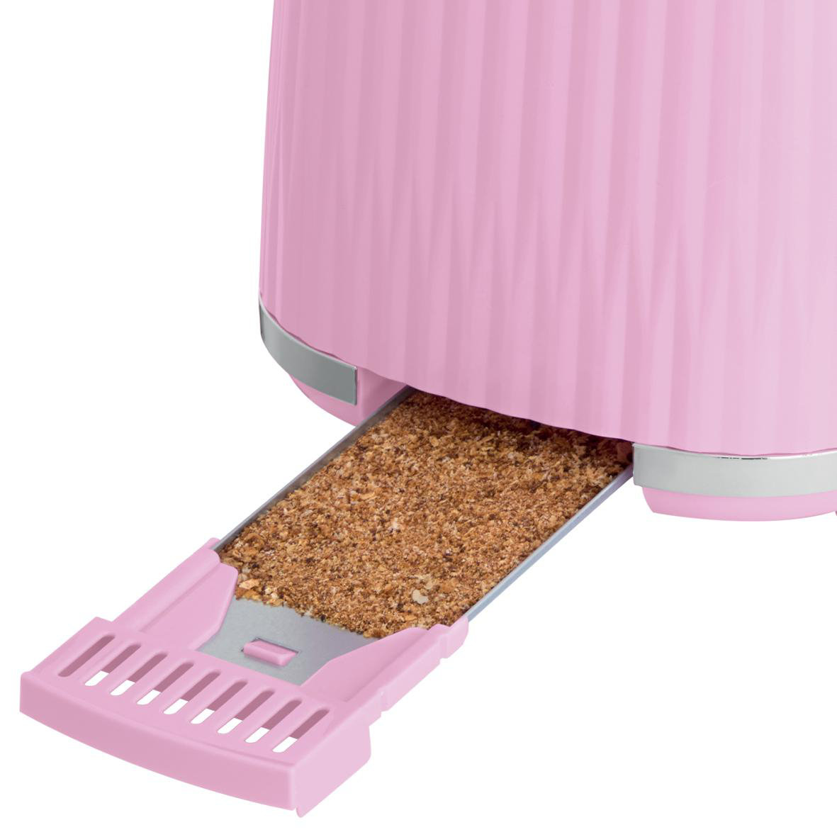 Rosa Toaster mit Krümeln in der Auffangschale. Rosa, geriffeltes Design mit silberfarbenem Rand.