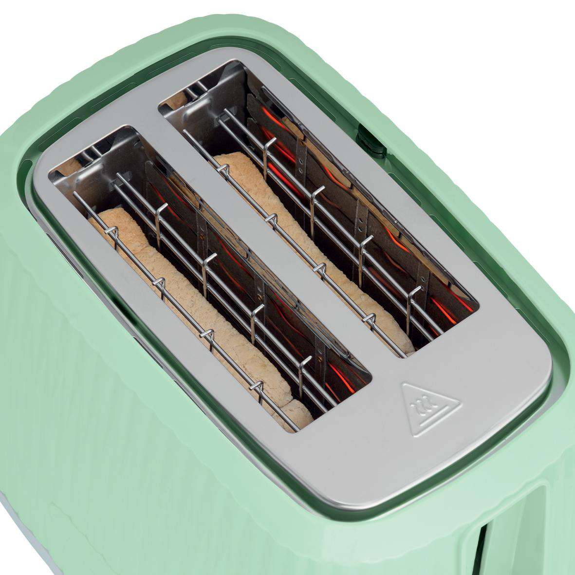 Minzgrüner Toaster mit Brot, Heizelemente werden gezeigt.