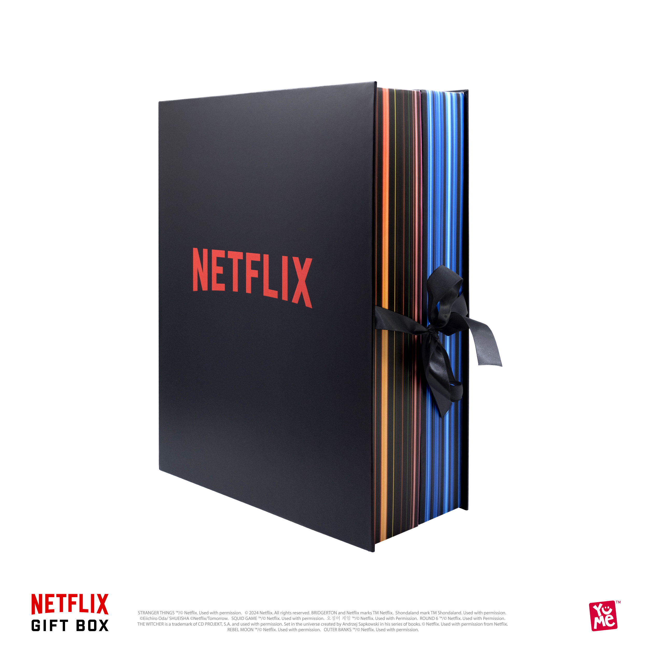 Schwarze Netflix-Geschenkbox mit rotem Logo und Schleife, mit verschiedenen bunten Kanten.