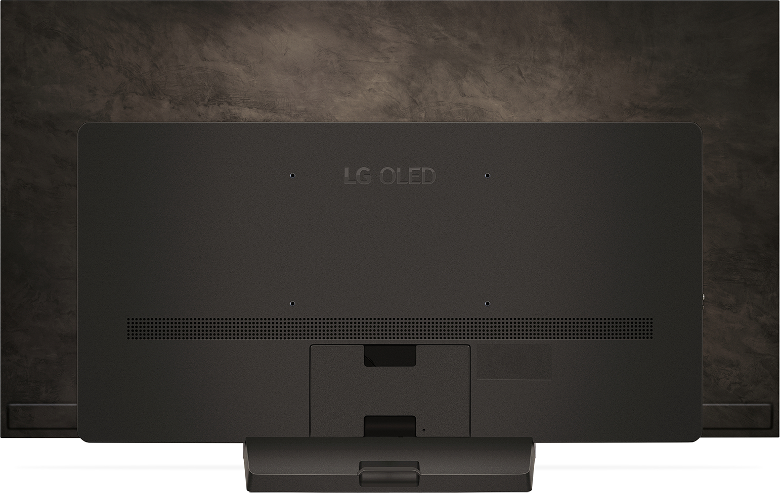 Rückansicht eines schwarzen LG OLED-Fernsehers. Der Fernseher hat einen Ständer, Anschlüsse und das LG OLED-Logo.