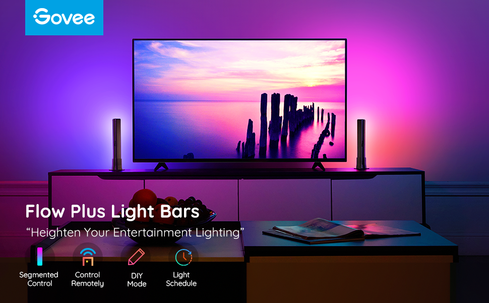 TV standında Flow Plus ışık çubukları kurulumu. Renkli ışıklarla bir TV açık.