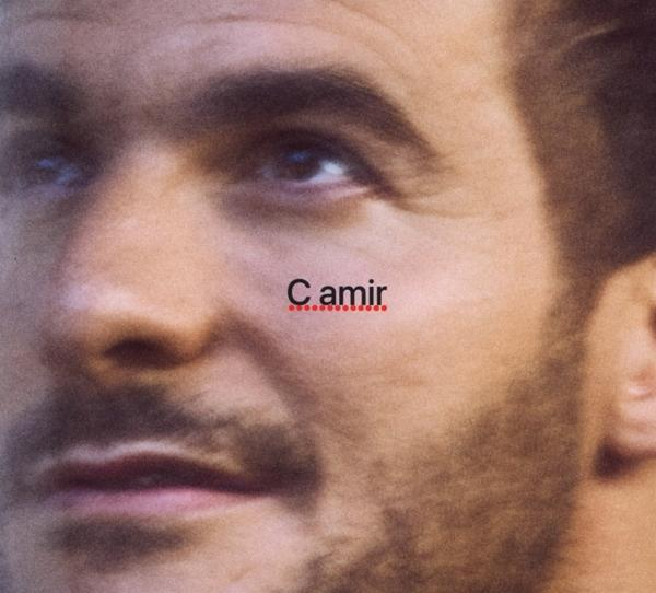 Albumcover: Nahaufnahme des Gesichts eines Mannes. Text: C. Amir.