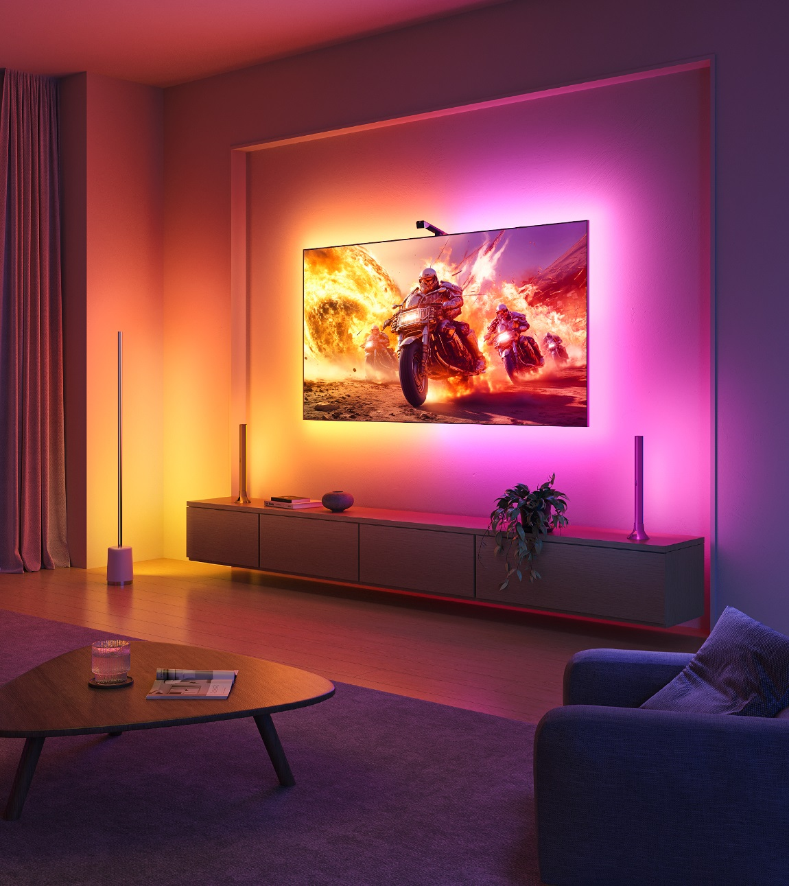 Motor yarışı oyunu gösteren bir TV ile oturma odası, renk değiştiren ışıklarla.