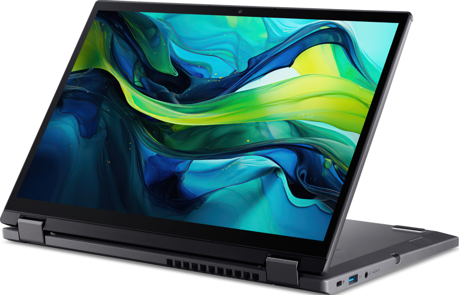 Ein Laptop, geöffnet, zeigt den Bildschirm. Der Laptop ist dunkelgrau, der Bildschirm zeigt ein farbenfrohes Design.