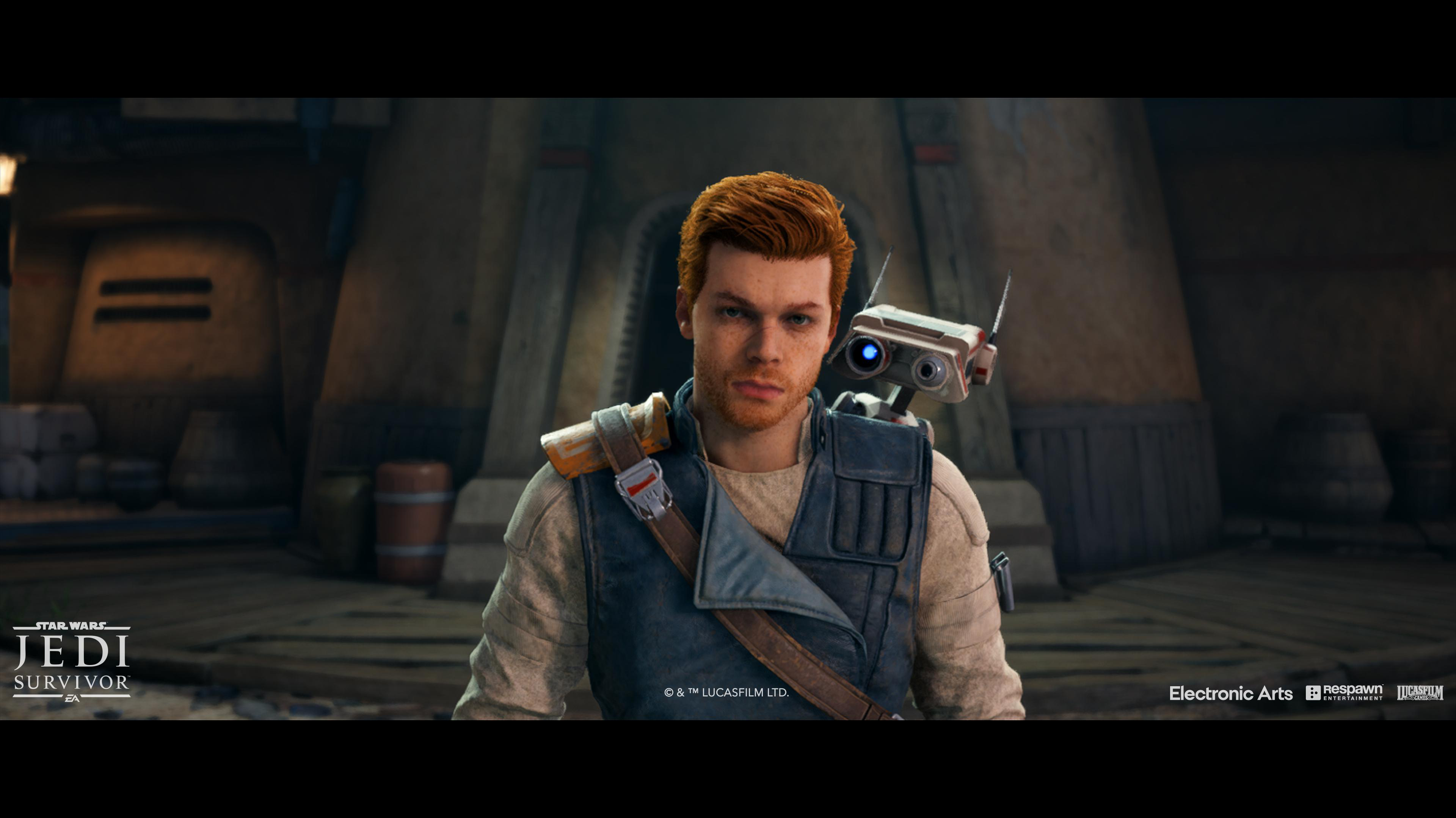 Ein Mann mit rotem Haar und einem Roboterbegleiter in einer Star Wars-Szene.